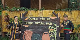 Rumah tradisional Tobilung — penginapan dan pengalaman kampung autentik.